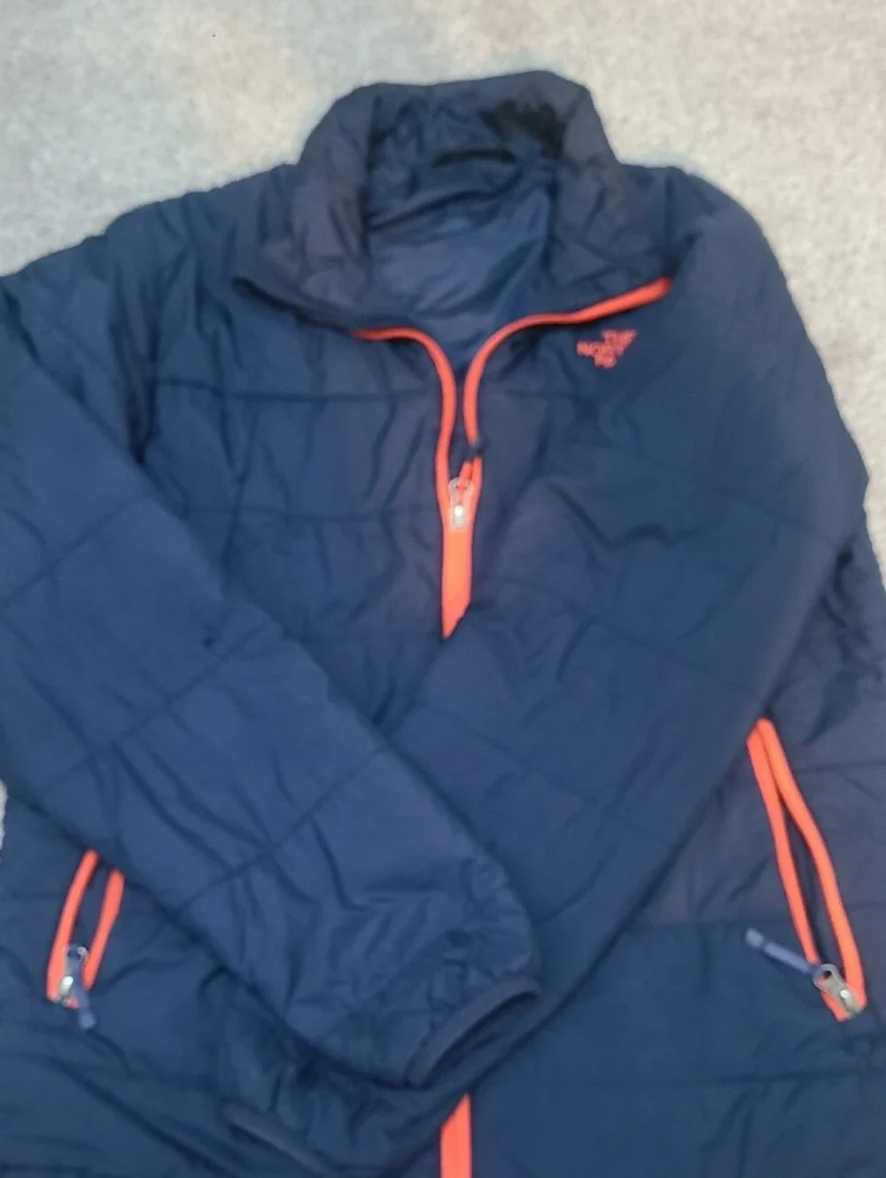The North Face Navy Blue Jacket with Orange Trim